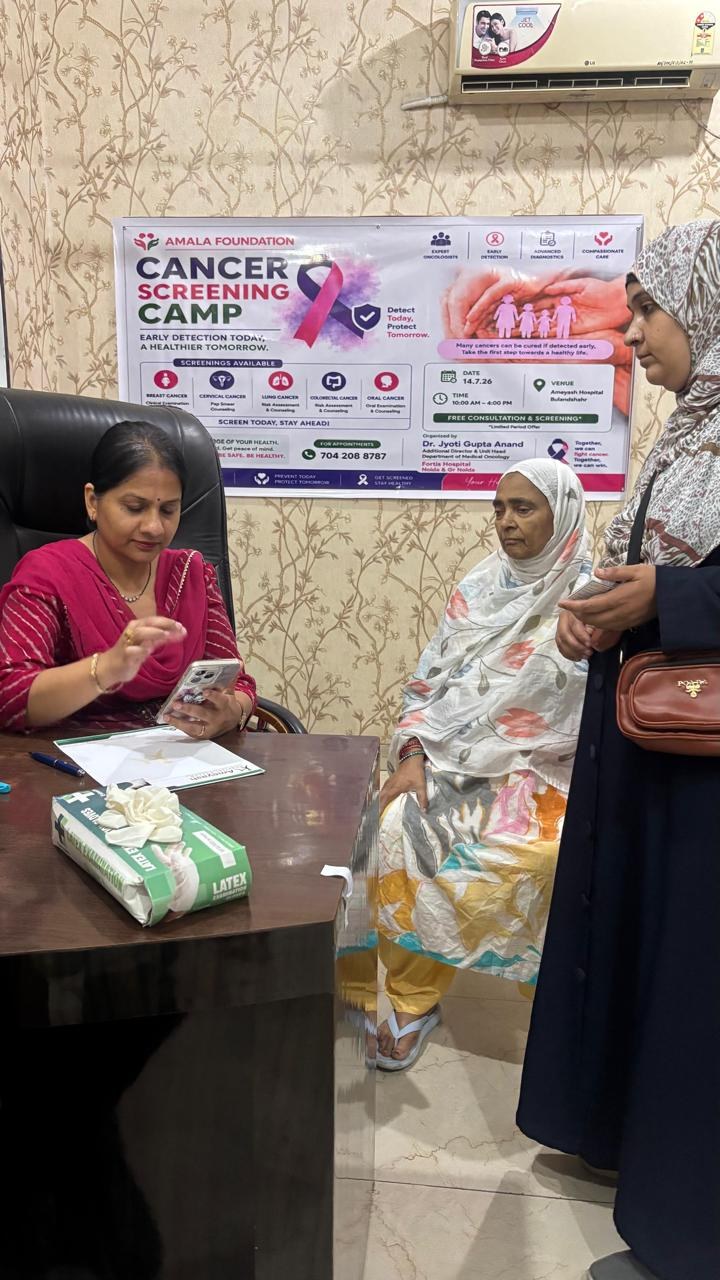 Dr. Jyoti Gupta Anand consulting patients at an Amala Foundation cancer screening camp